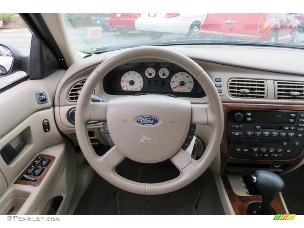 2004 Ford Taurus SEL Sedan Medium Parchment Steering Wheel Photo #59760116