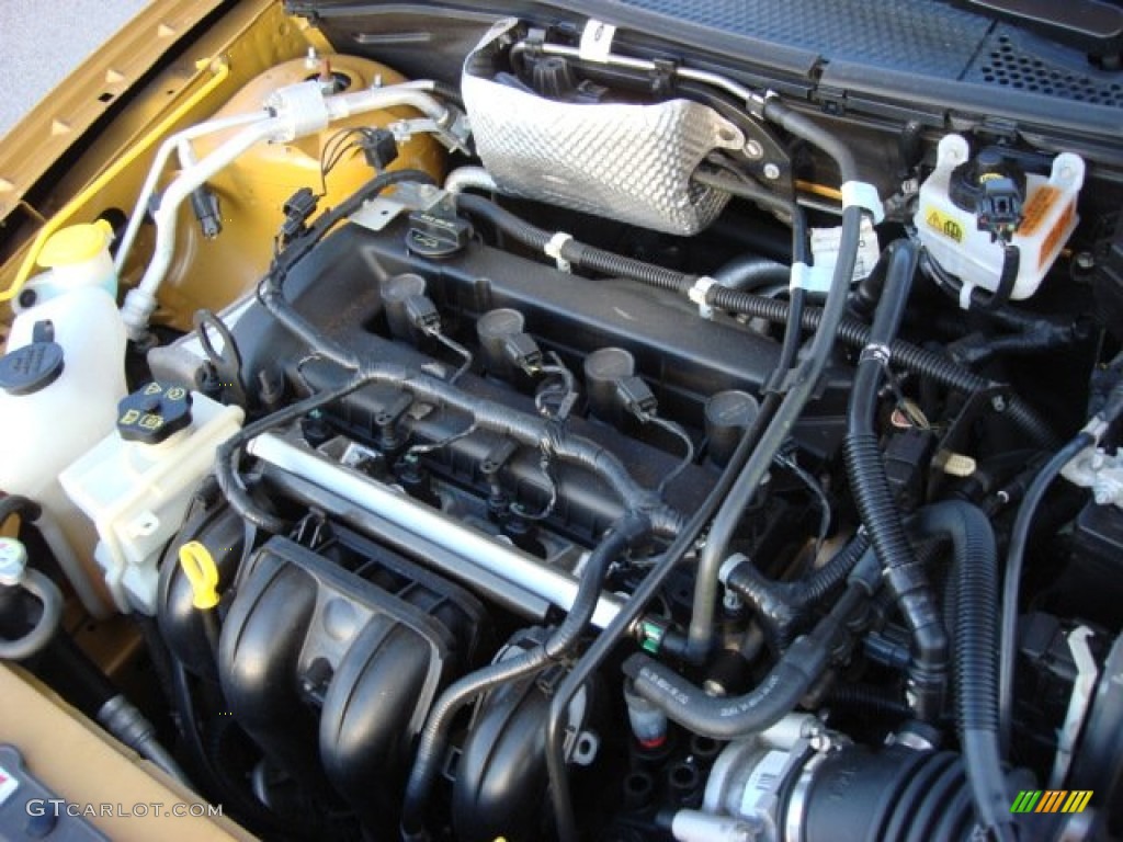 2009 Focus SE Sedan - Amber Gold Metallic / Medium Stone photo #24