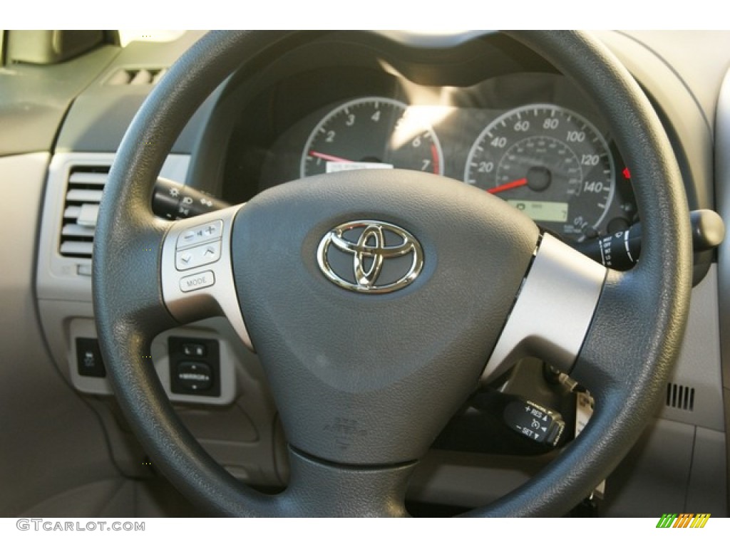 2012 Toyota Corolla LE Ash Steering Wheel Photo #59778050