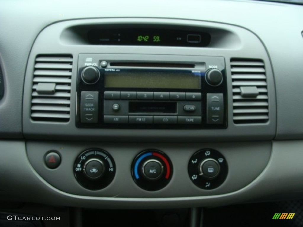 2004 Camry LE - Catalina Blue Metallic / Stone photo #11