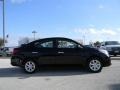 2012 Super Black Nissan Versa 1.6 SL Sedan  photo #4