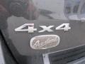 2011 Jeep Grand Cherokee Overland 4x4 Badge and Logo Photo