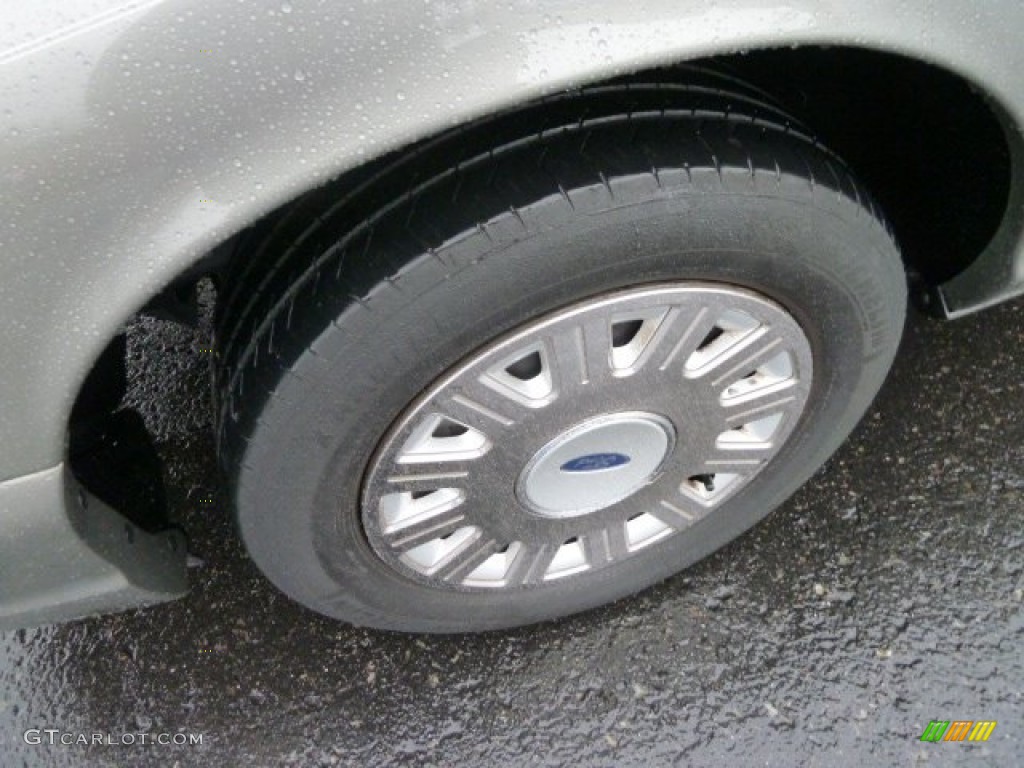 2003 Ford Crown Victoria Sedan Wheel Photo #59787347
