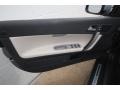 Soverign Hide Calcite Leather/Off Black 2011 Volvo C70 T5 Door Panel