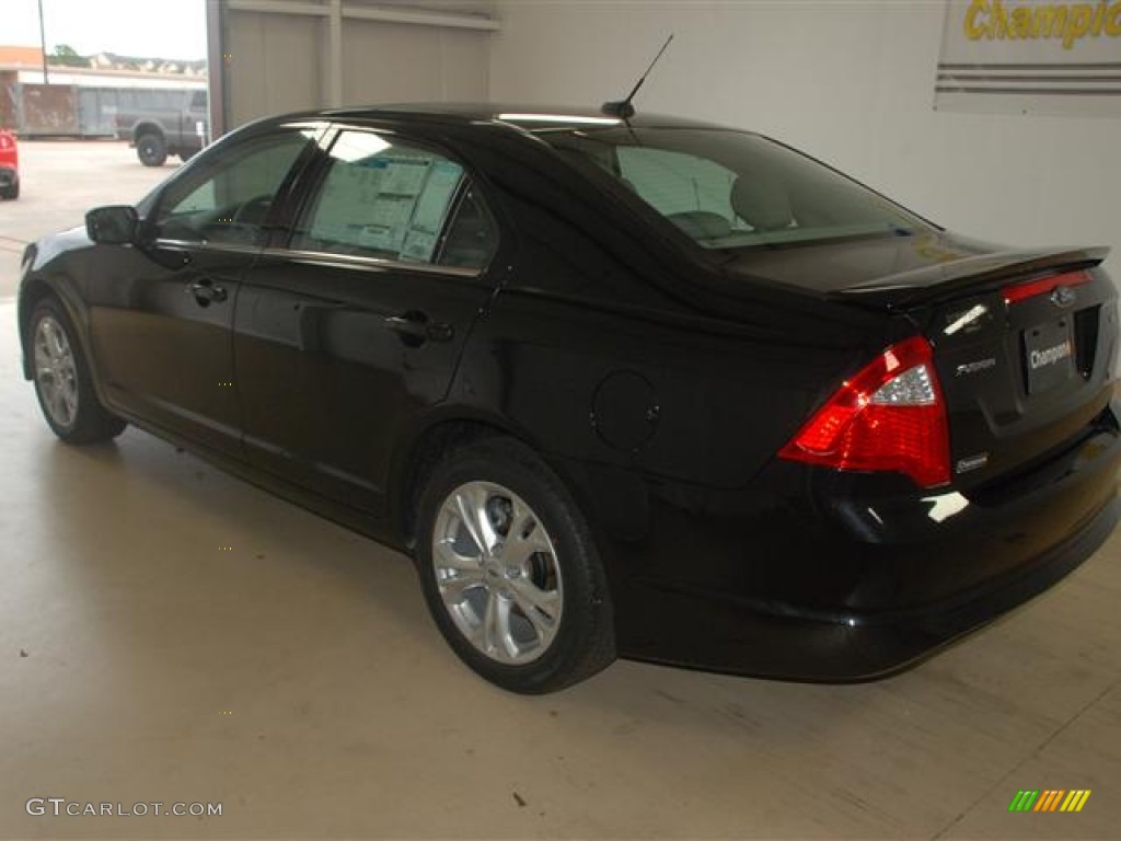 2012 Fusion SE - Tuxedo Black Metallic / Medium Light Stone photo #6