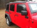2012 Flame Red Jeep Wrangler Unlimited Sport S 4x4  photo #22