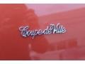 1977 Cadillac Coupe DeVille Standard Coupe DeVille Model Badge and Logo Photo