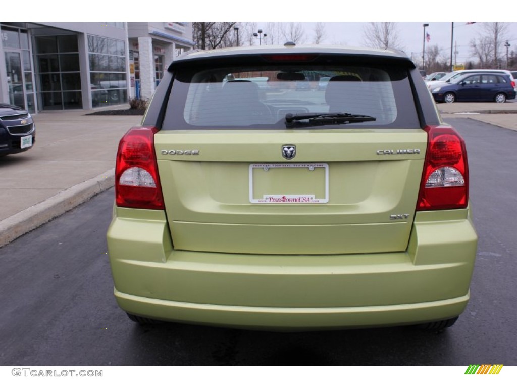 2010 Caliber SXT - Optic Green Metallic / Dark Slate Gray photo #11