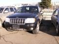 2004 Brillant Black Crystal Pearl Jeep Grand Cherokee Overland 4x4  photo #1