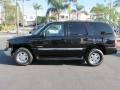 2003 Onyx Black GMC Yukon SLT 4x4  photo #3