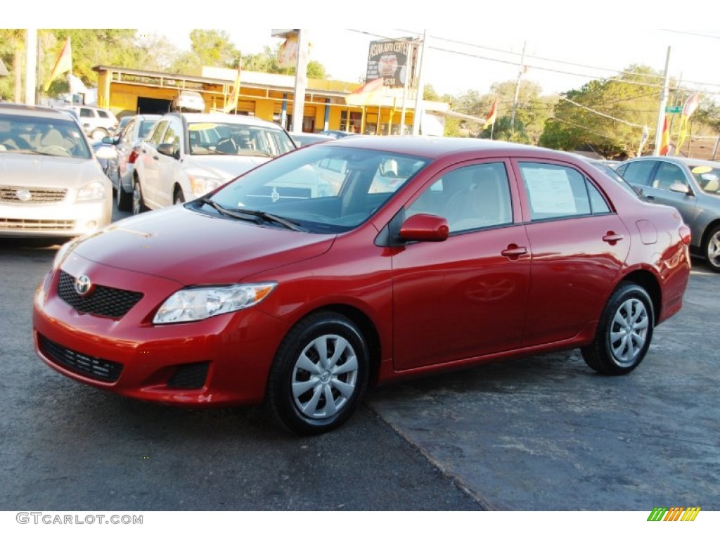 Barcelona Red Metallic 2009 Toyota Corolla LE Exterior Photo #59900204