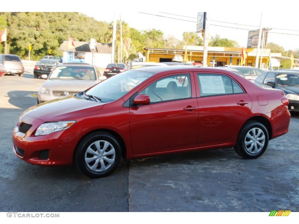 Barcelona Red Metallic 2009 Toyota Corolla LE Exterior Photo #59900216