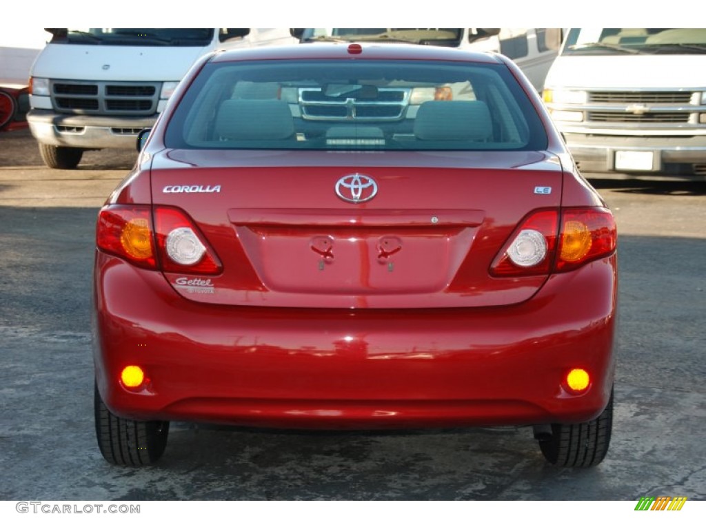 Barcelona Red Metallic 2009 Toyota Corolla LE Exterior Photo #59900231