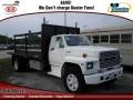 Oxford White 1990 Ford F700 Regular Cab Stake Truck