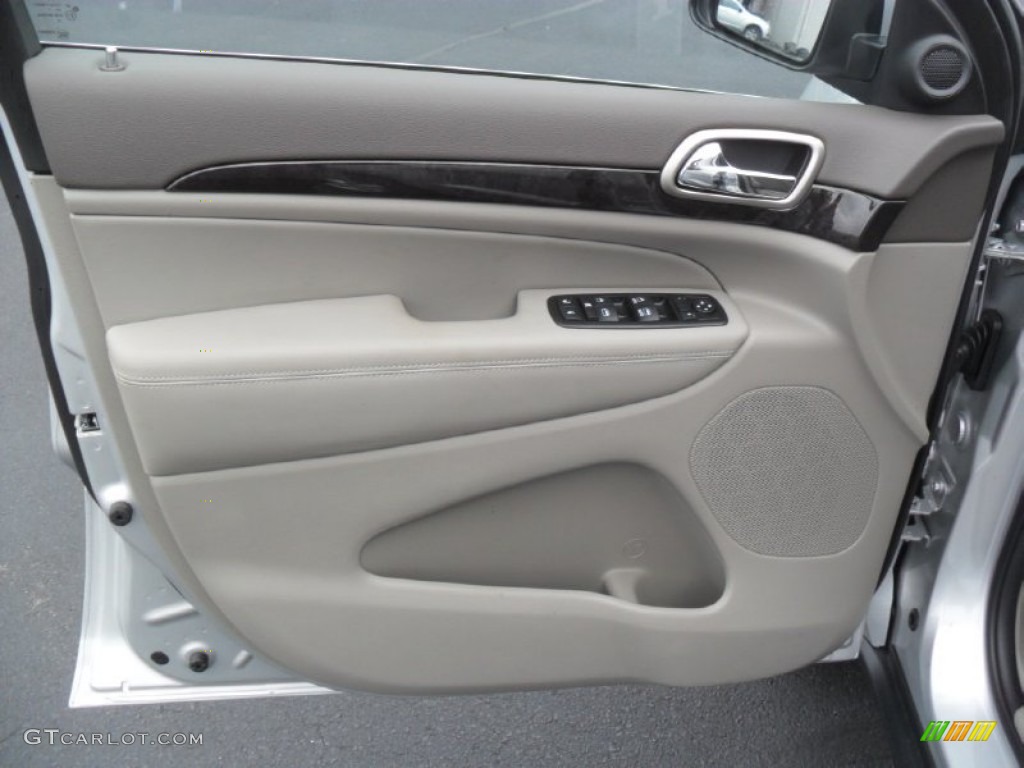 2012 Jeep Grand Cherokee Laredo 4x4 Dark Graystone/Medium Graystone Door Panel Photo #59954639