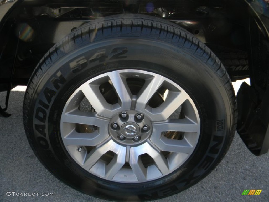 2009 Nissan Frontier LE Crew Cab 4x4 Wheel Photos