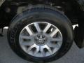2009 Nissan Frontier LE Crew Cab 4x4 Wheel and Tire Photo