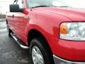 2004 Bright Red Ford F150 XLT SuperCab 4x4  photo #16