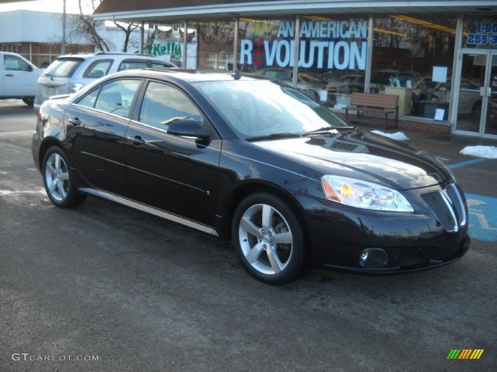 2009 G6 GT Sedan - Carbon Black Metallic / Light Taupe photo #1