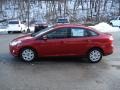 2012 Red Candy Metallic Ford Focus SE Sedan  photo #5