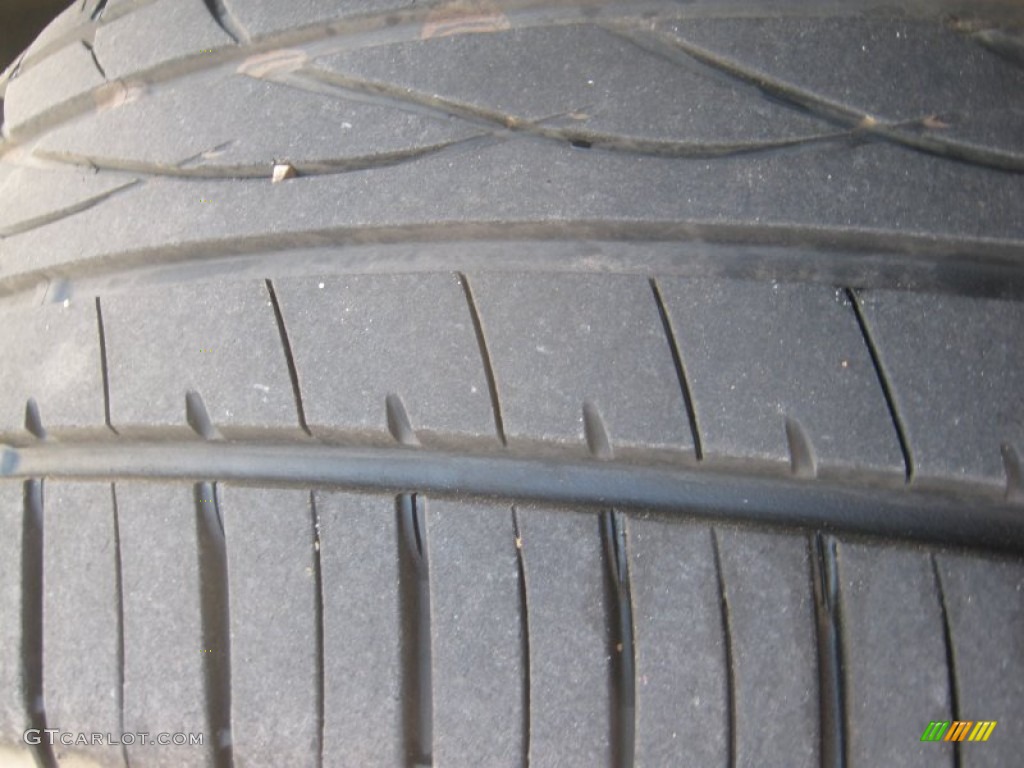 2007 Outlook XE - Gold Mist / Black photo #22