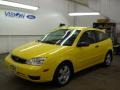 2005 Egg Yolk Yellow Ford Focus ZX3 SES Coupe  photo #1
