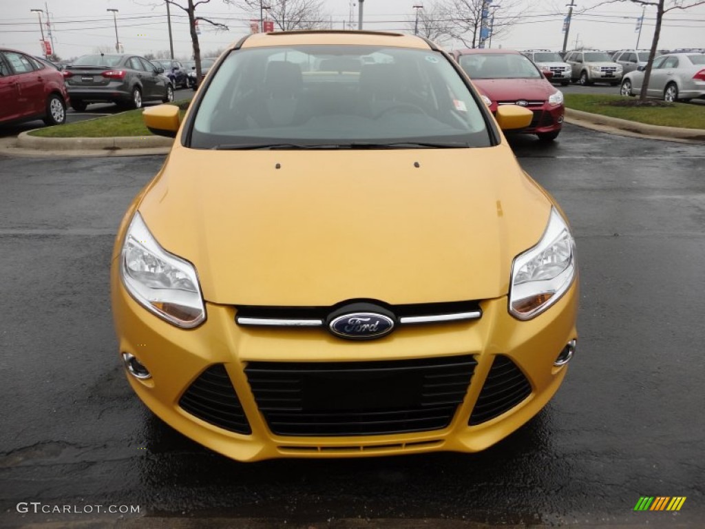 Yellow Blaze Tricoat Metallic 2012 Ford Focus SE Sport Sedan Exterior Photo #60094176