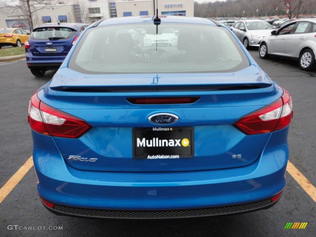 2012 Focus SE Sport Sedan - Blue Candy Metallic / Two-Tone Sport photo #4