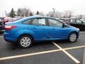 2012 Blue Candy Metallic Ford Focus SE Sedan  photo #5