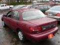 Red - Sephia Sedan Photo No. 4