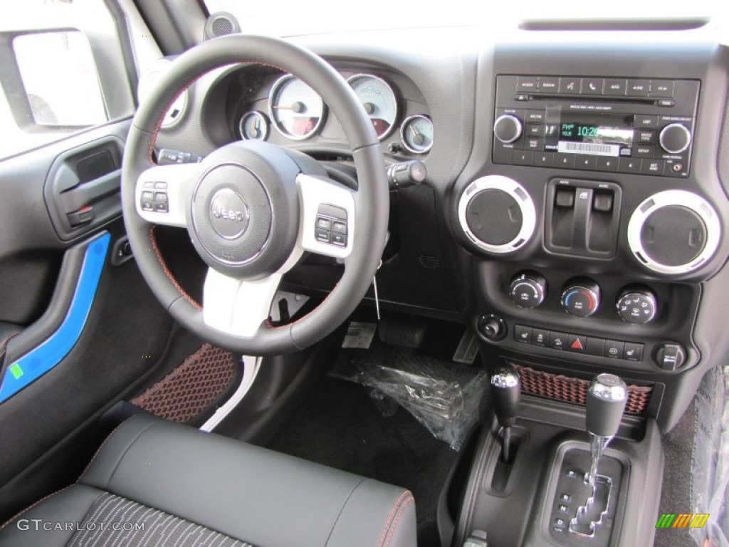 2012 Jeep Wrangler Sahara Arctic Edition 4x4 Black with Polar White Accents/Orange Stitching Dashboard Photo #60141906