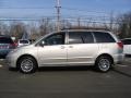 2009 Desert Sand Mica Toyota Sienna XLE AWD  photo #8