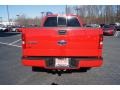 2005 Bright Red Ford F150 STX SuperCab 4x4  photo #4