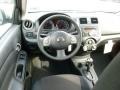 2012 Brilliant Silver Metallic Nissan Versa 1.6 SL Sedan  photo #14