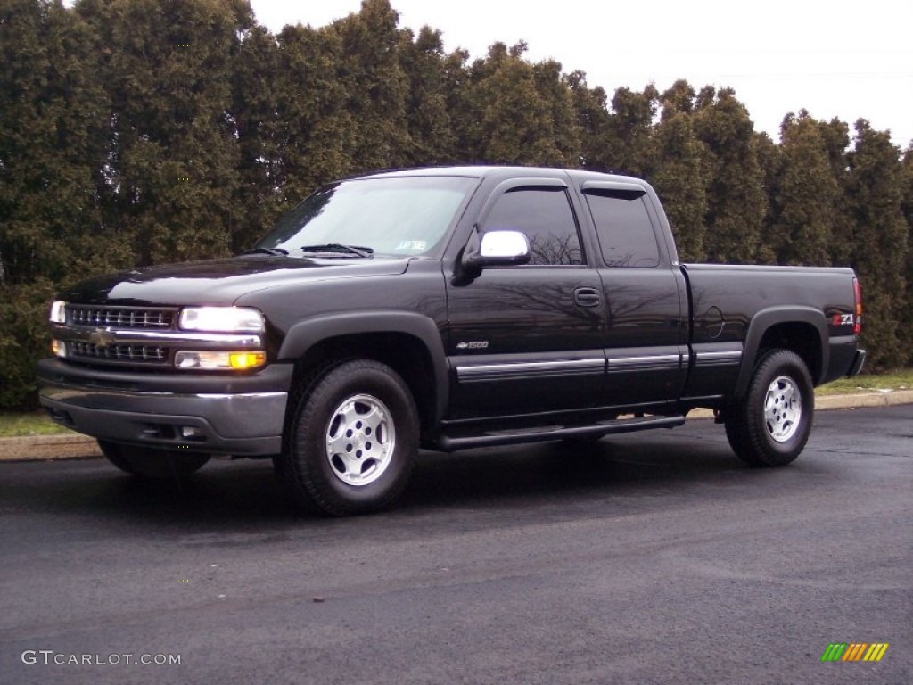 Onyx Black 2001 Chevrolet Silverado 1500 LS Extended Cab 4x4 Exterior Photo #60199285