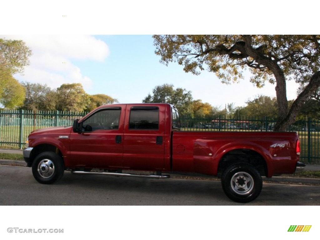 2001 F350 Super Duty Lariat Crew Cab 4x4 Dually - Toreador Red Metallic / Medium Graphite photo #2