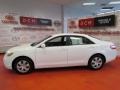 Super White - Camry LE Photo No. 4