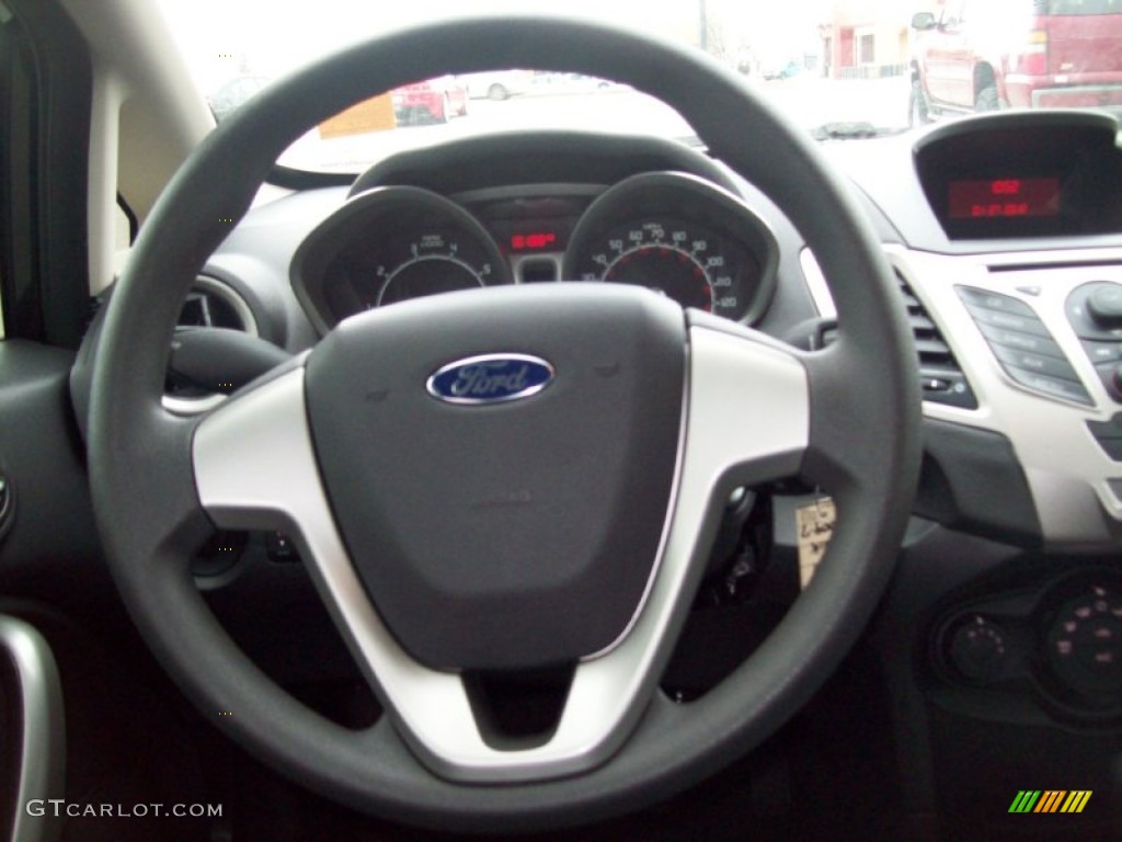 2011 Ford Fiesta SE Hatchback Charcoal Black/Blue Cloth Steering Wheel Photo #60243428