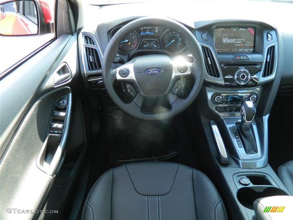 2012 Focus Titanium Sedan - Red Candy Metallic / Charcoal Black Leather photo #13