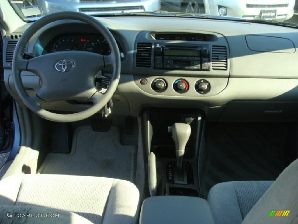 2004 Camry LE - Catalina Blue Metallic / Stone photo #9