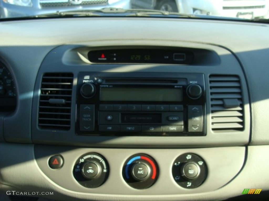 2004 Camry LE - Catalina Blue Metallic / Stone photo #11