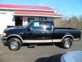 2002 Black Ford F150 XLT SuperCab 4x4  photo #2