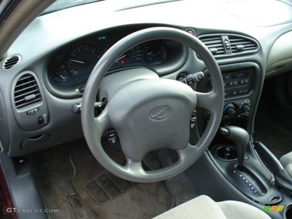 2003 Alero GX Sedan - Ruby Red Metallic / Neutral photo #8