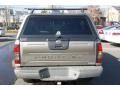 2004 Polished Pewter Metallic Nissan Frontier XE V6 King Cab 4x4  photo #5