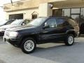 2004 Brillant Black Crystal Pearl Jeep Grand Cherokee Limited  photo #3