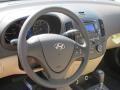 Beige 2012 Hyundai Elantra GLS Touring Steering Wheel