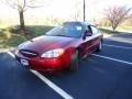 2002 Matador Red Metallic Ford Taurus SEL  photo #3