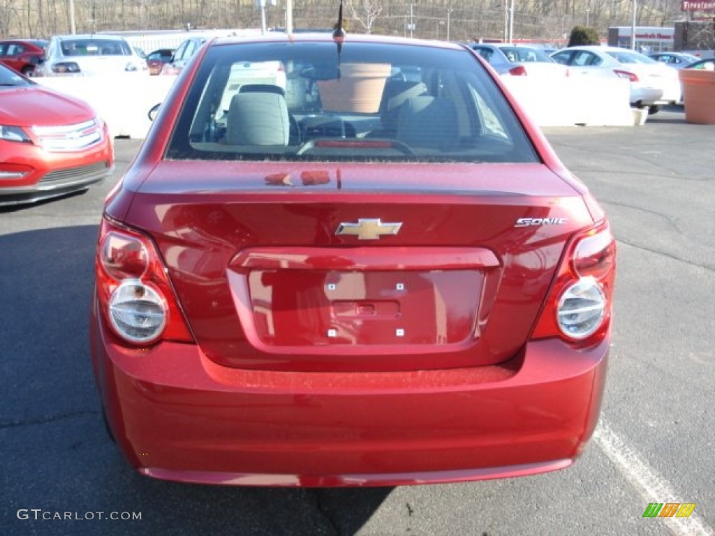 2012 Sonic LS Sedan - Crystal Red Tintcoat / Jet Black/Dark Titanium photo #7