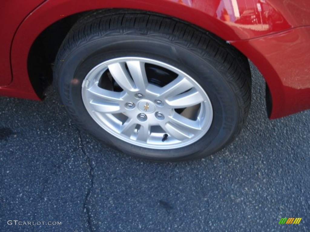 2012 Sonic LS Sedan - Crystal Red Tintcoat / Jet Black/Dark Titanium photo #9