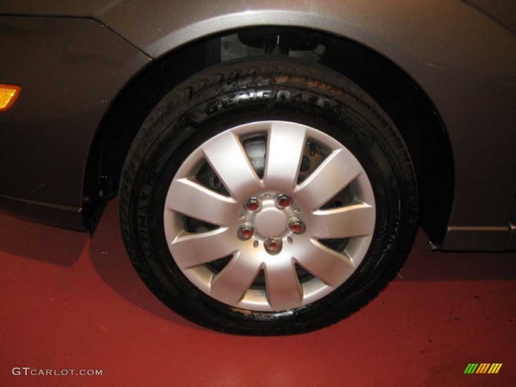 2005 Focus ZX4 SE Sedan - Liquid Grey Metallic / Dark Flint/Light Flint photo #23